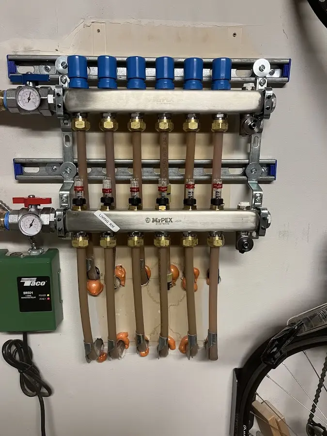 Plumber performing Water Heater Repair at a residential property in Underhill